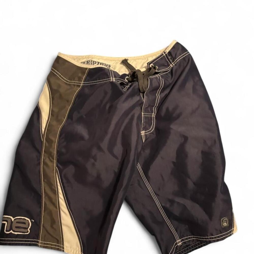 Ripzone board shorts with navy blue, beige, and gray color blocking